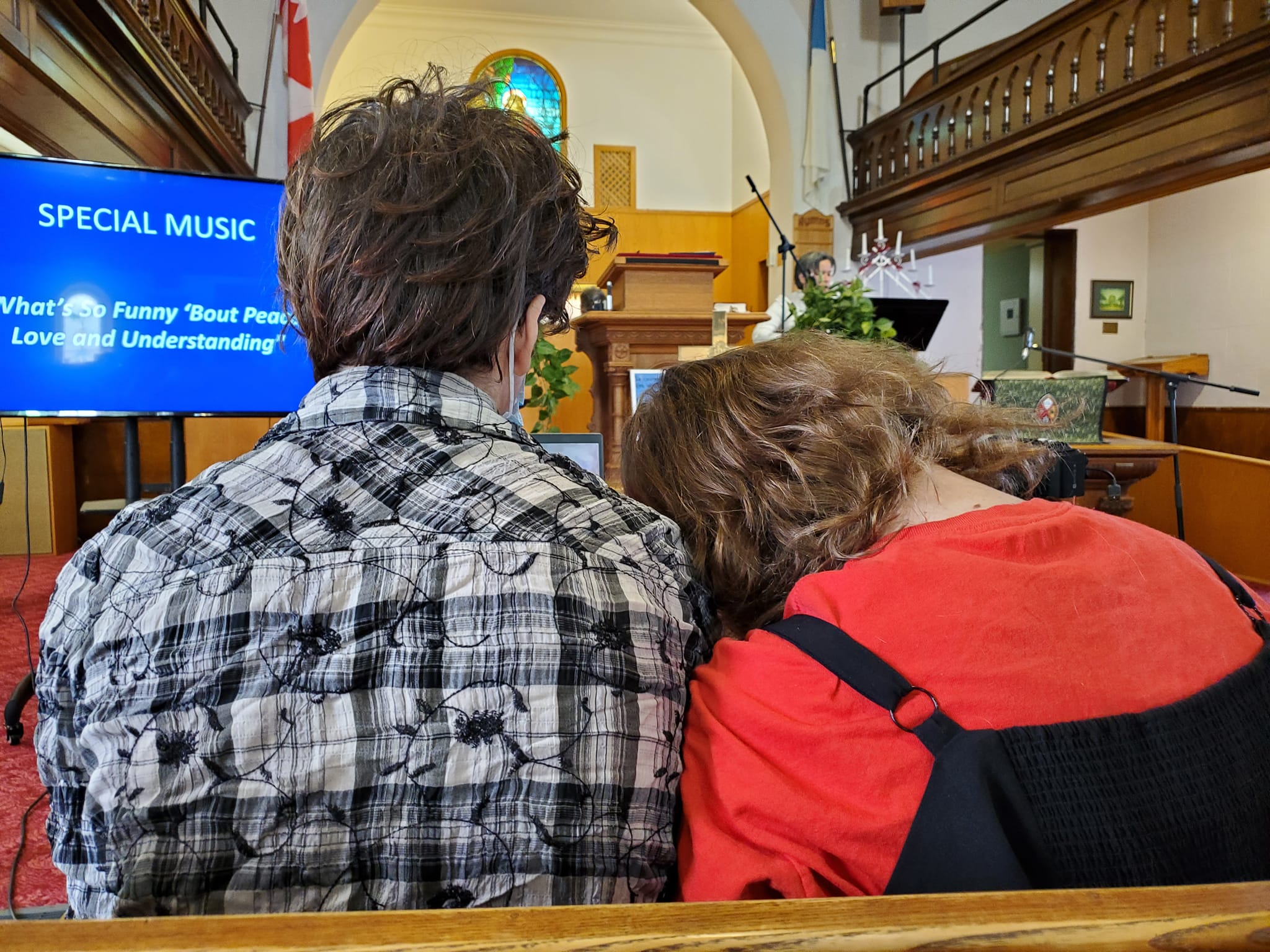 Sunday worship service at Bloomfield United Church — congregation in prayer and song